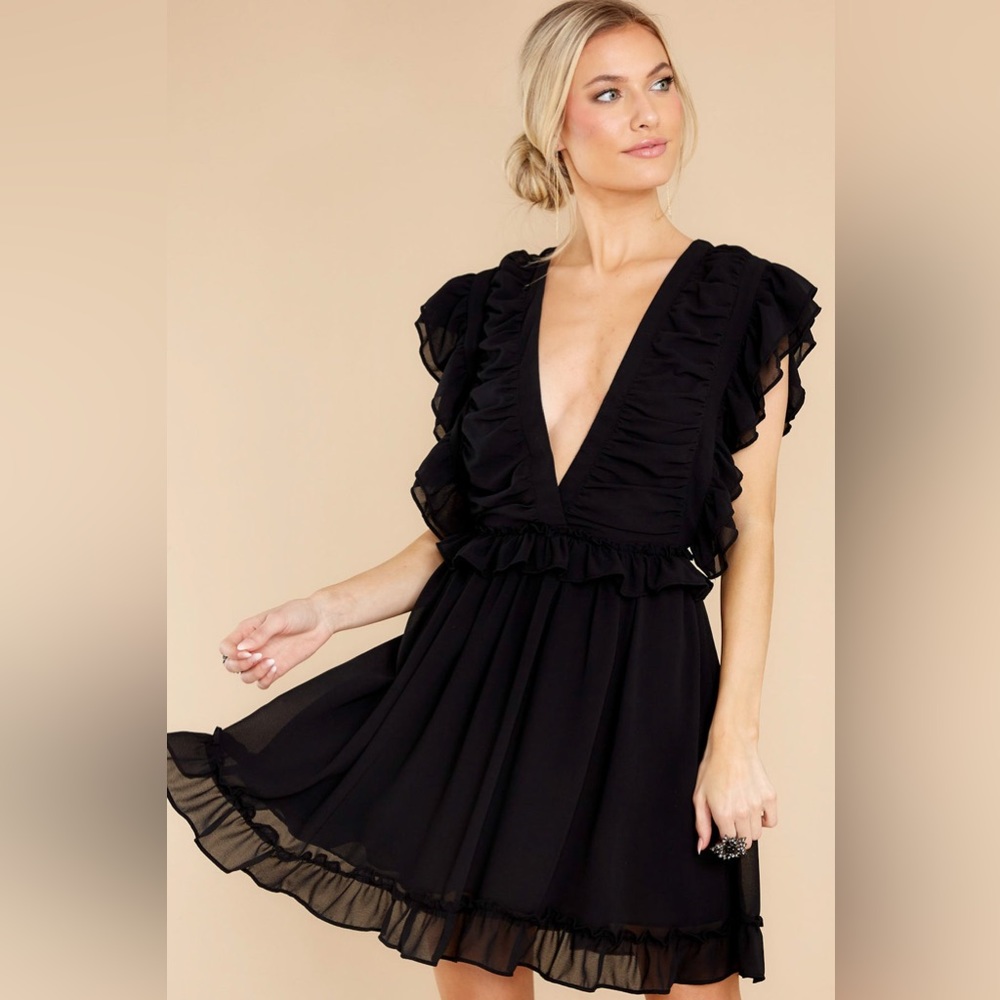On A Rendezvous Black Dress size medium deep v dress from red dress boutique